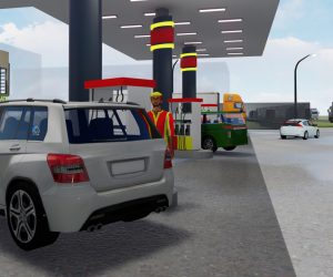 petrol attendant fueling car under canopy